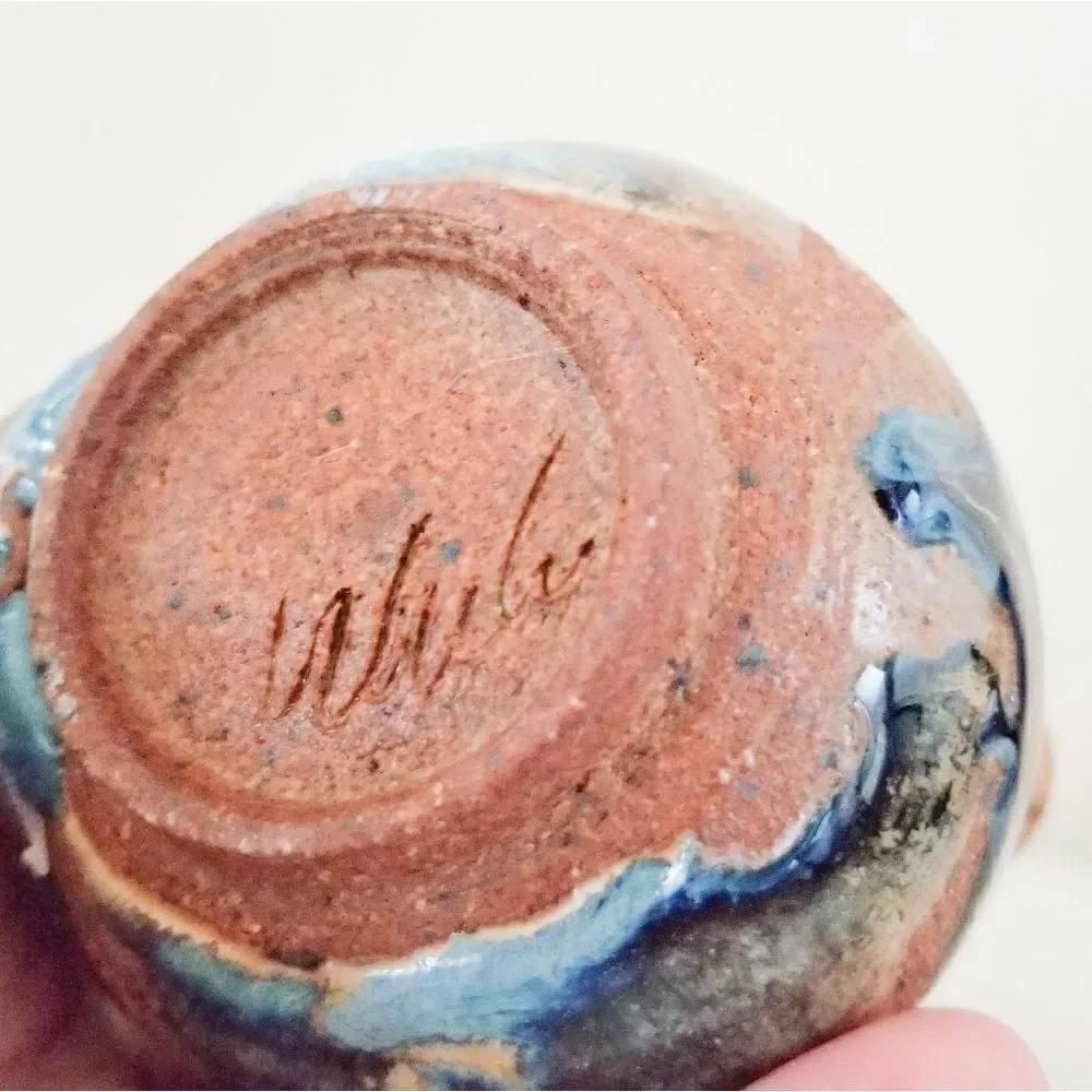 Pottery creamer signed by artist